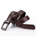 Brown leather belt with a silver buckle on a white background