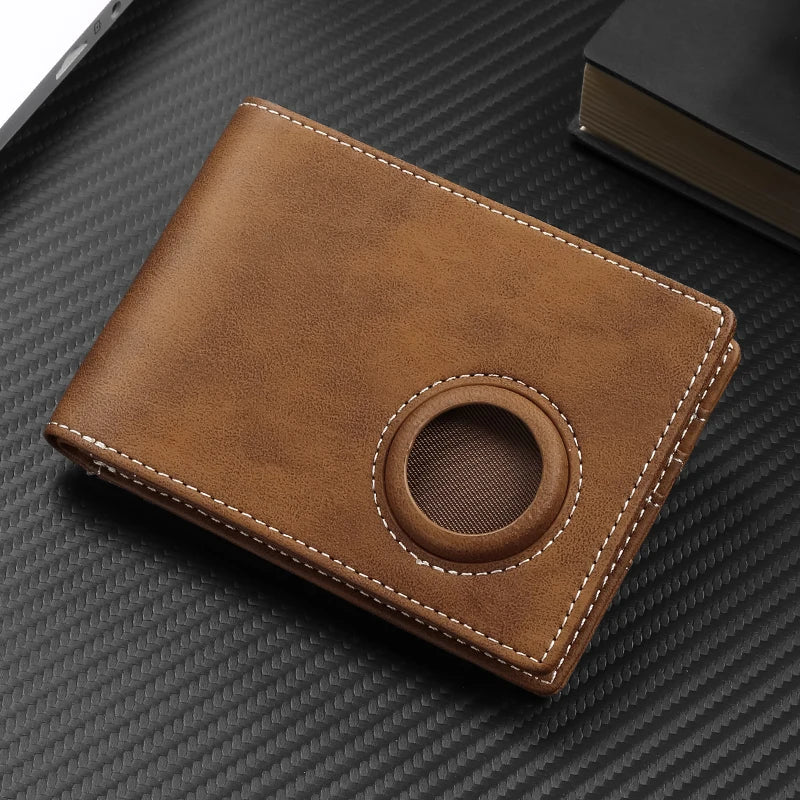 Brown leather wallet with a circular design on a textured black surface