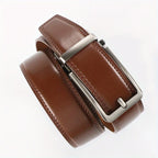Brown leather belt with silver buckle on a white background